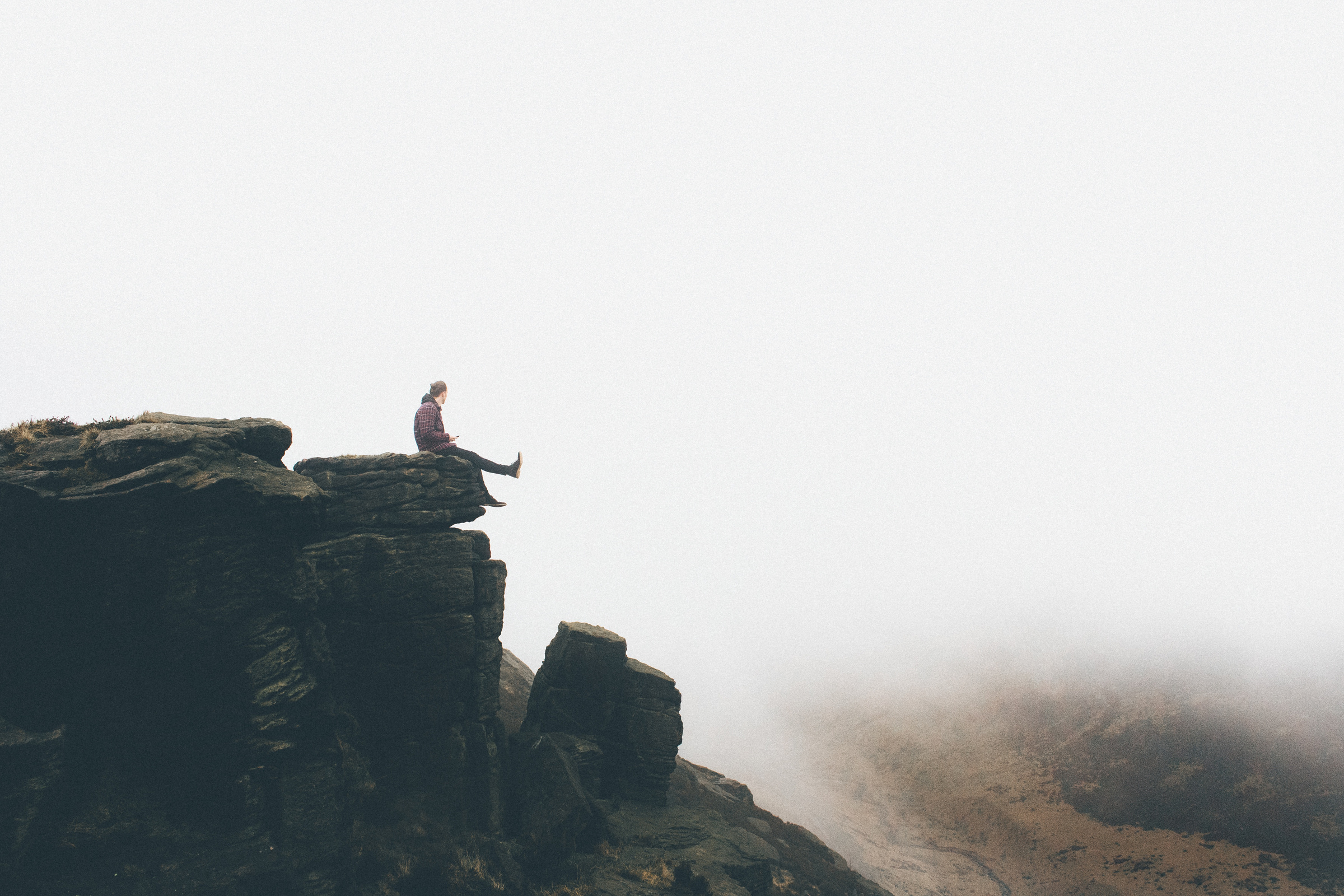 A Woman on Top of a Cliff