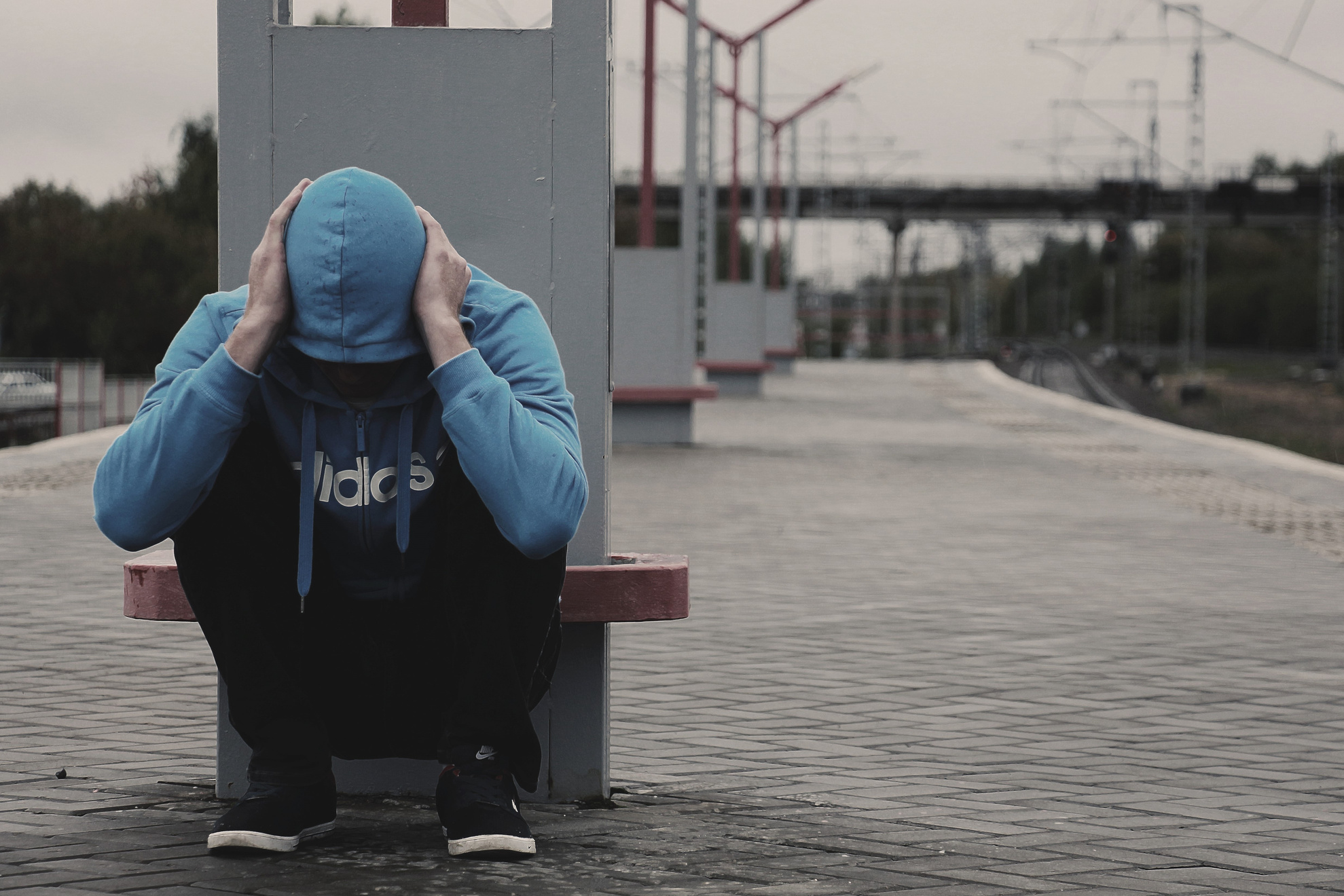 Hopeless Man in Train Station