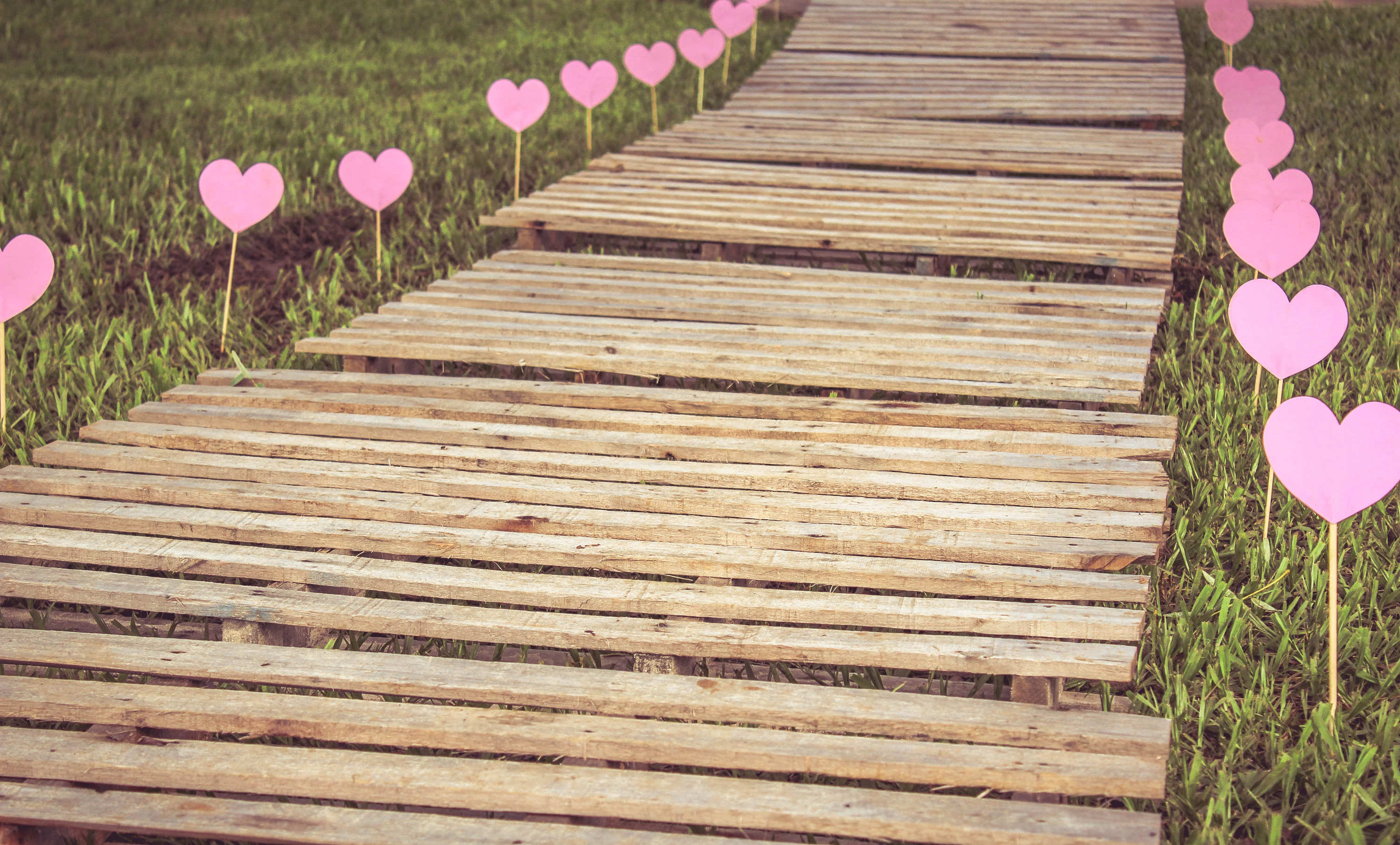 Heart Sticks by a Wooden Path