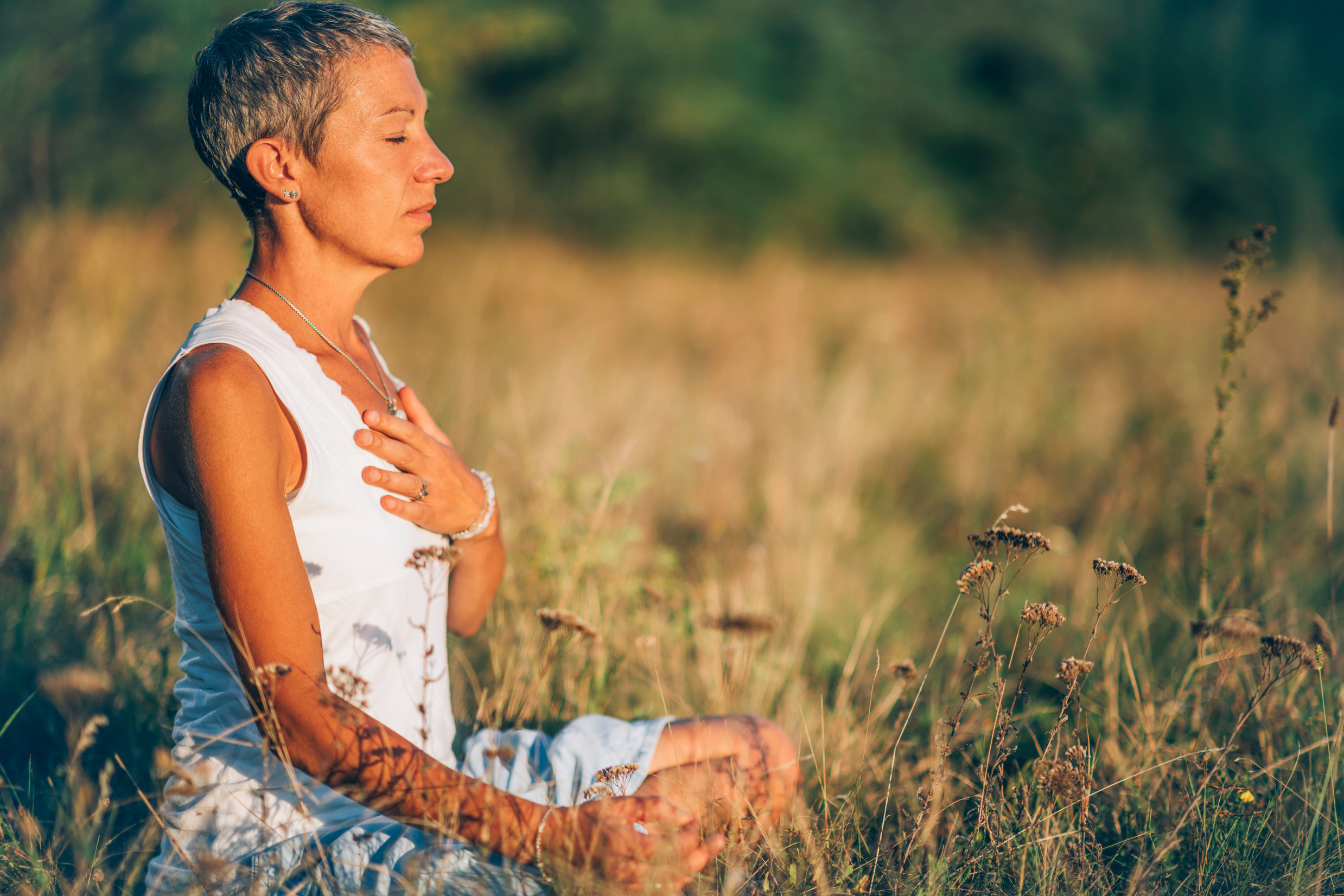 Positive Energy Meditation – Mindful Woman Meditating Outdoors, Absorbing the Positive Energy