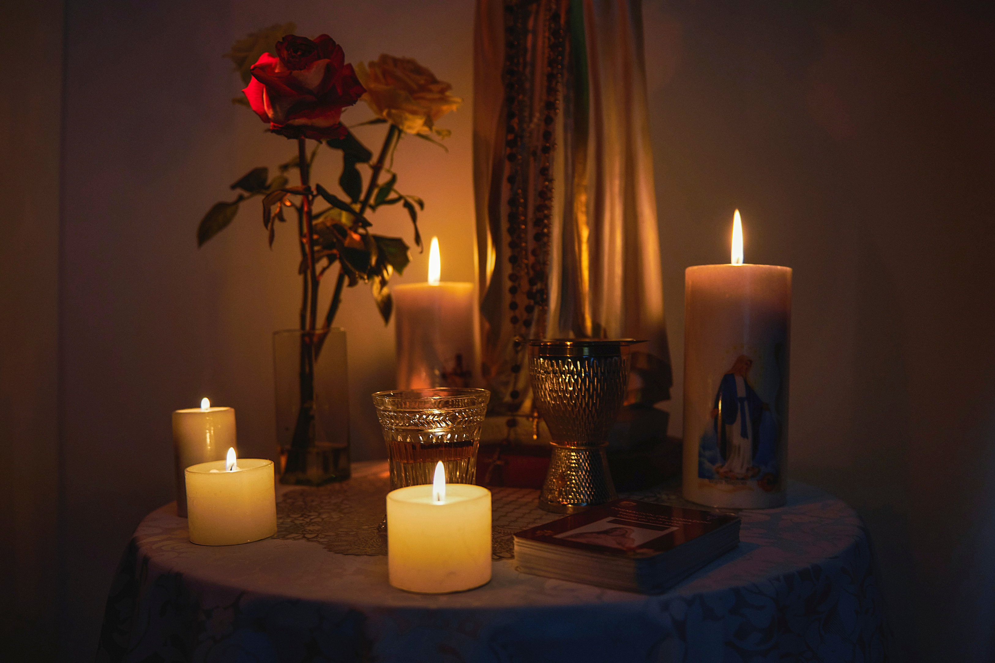 Candles and Flowers in Home Altar 