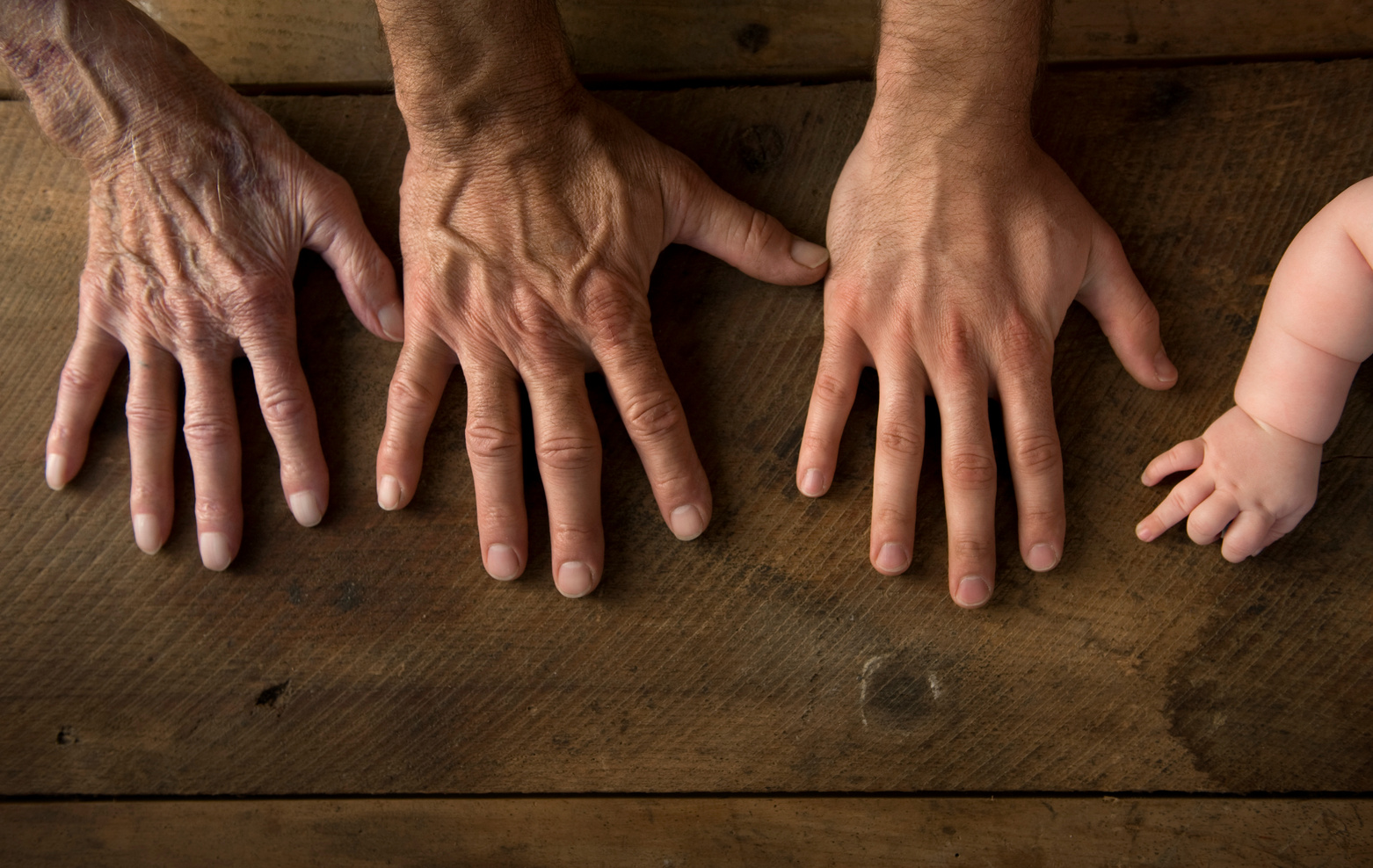 four generations of hands