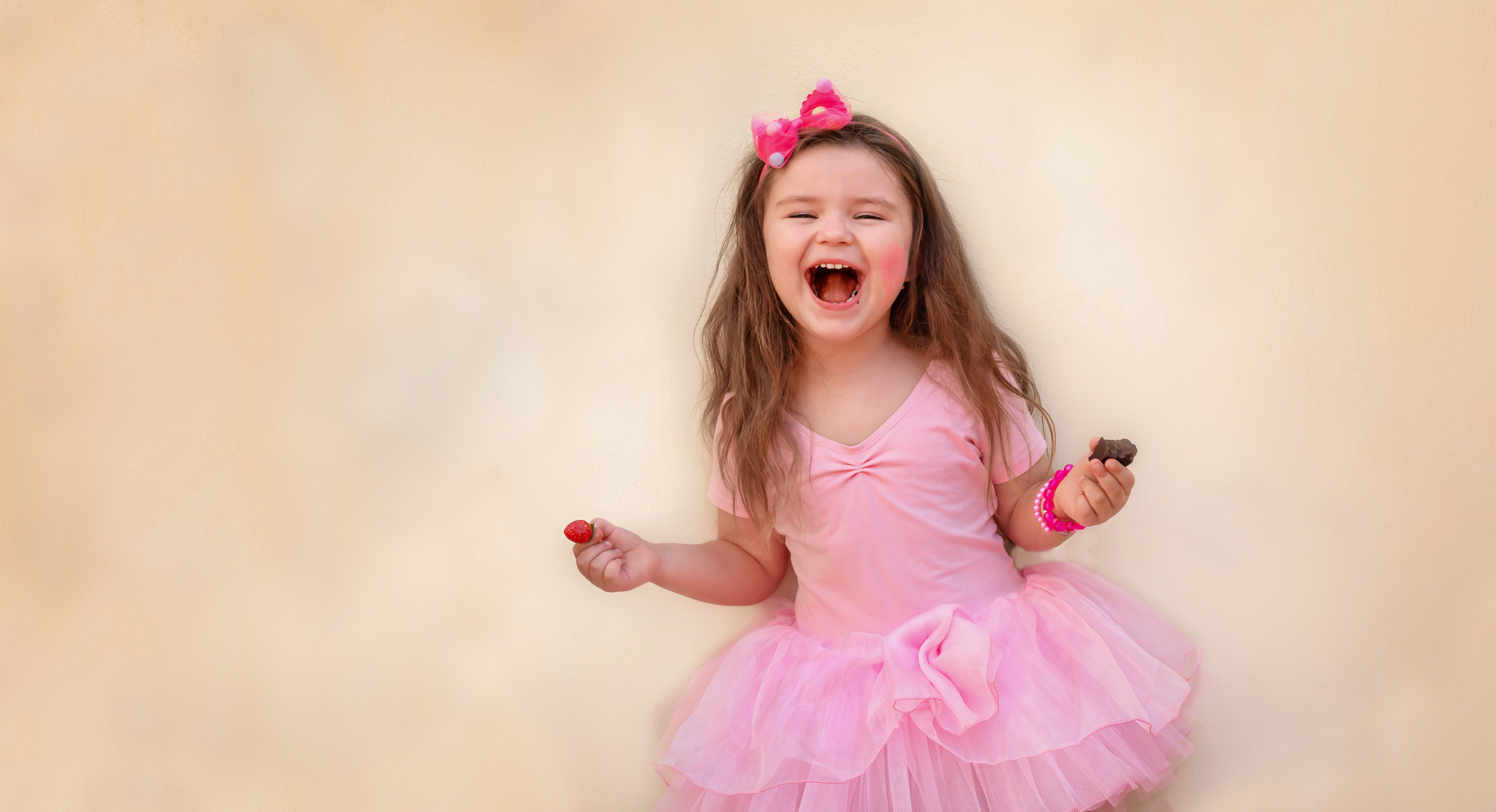 Happy Child with Strawberries and Chocolate