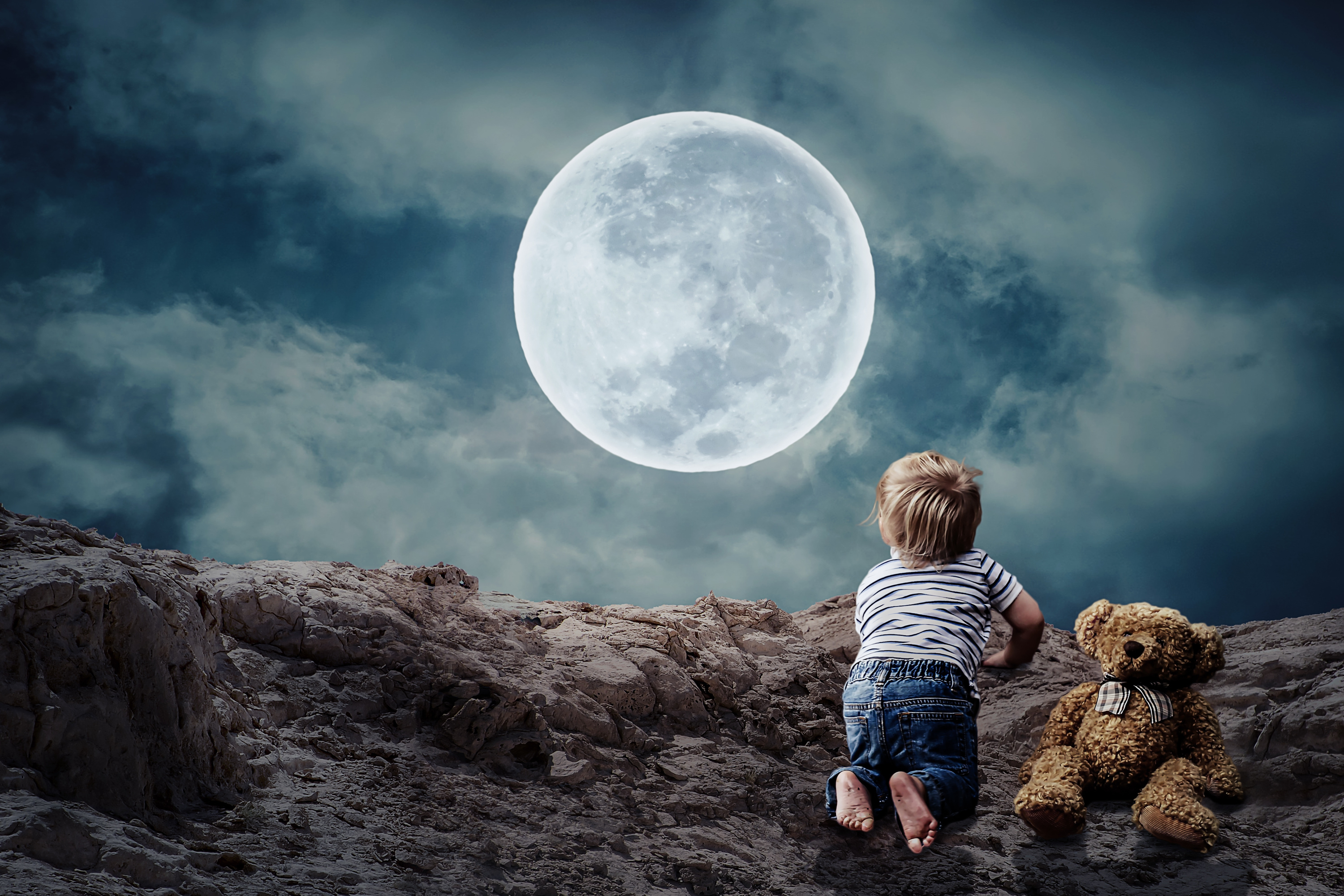 Photomontage Of Child Staring The Full Moon